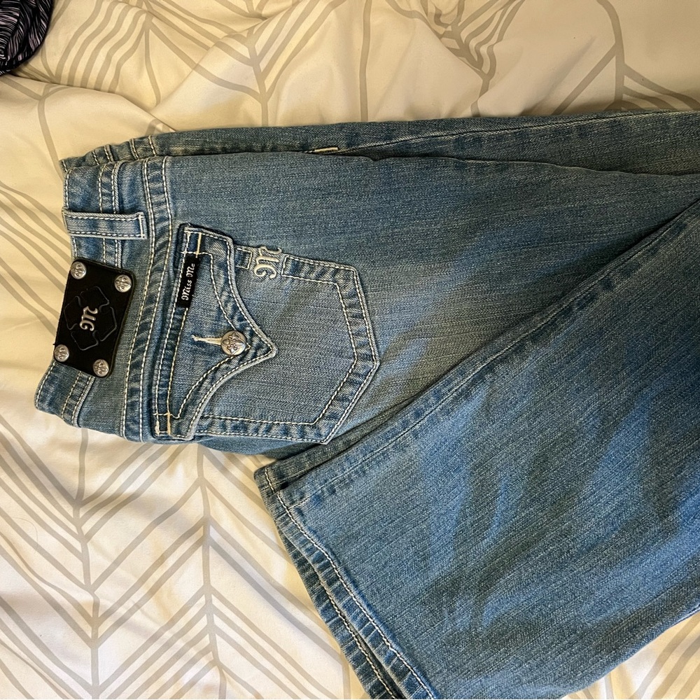 Light wash boot cut Miss Me jeans. Worn once.